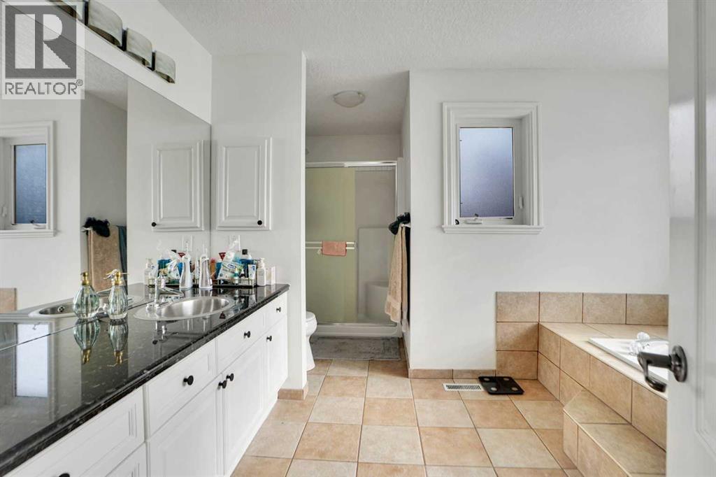 6 Strathridge Way SW, Calgary, Alberta  T3H 3S3 - Photo 34 - A2298508