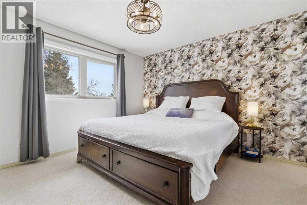 7 Woodmont Rise SW, Calgary, Alberta  T2W 4L4 - Photo 16 - A2298701