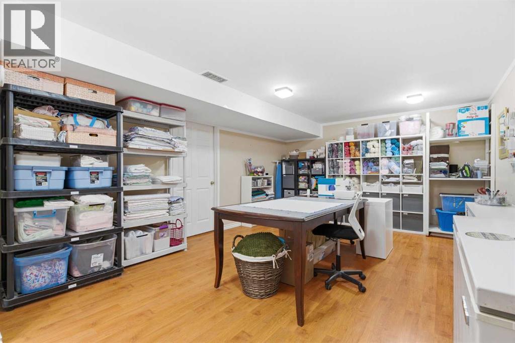 7 Woodmont Rise SW, Calgary, Alberta  T2W 4L4 - Photo 41 - A2298701