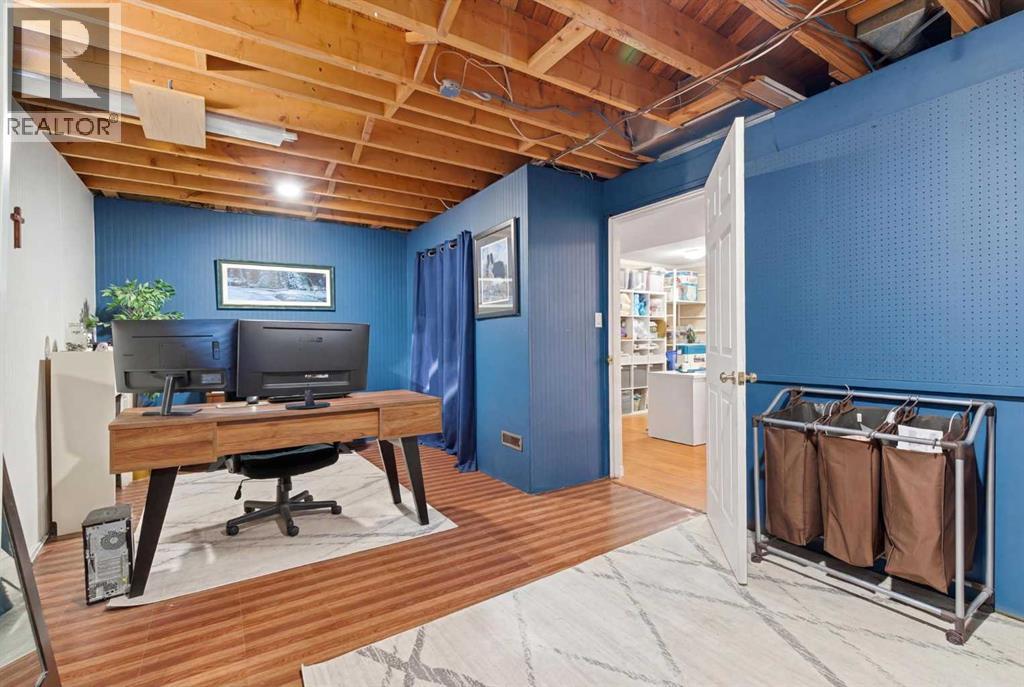 7 Woodmont Rise SW, Calgary, Alberta  T2W 4L4 - Photo 43 - A2298701