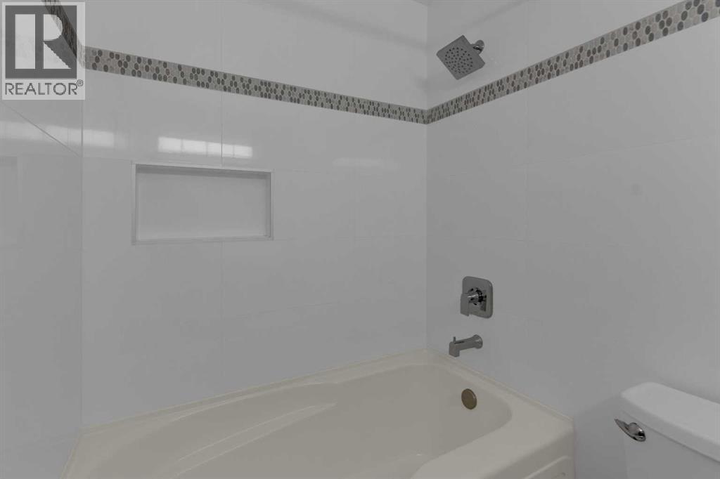 3, 64 Woodacres Crescent Sw, Calgary, Alberta  T2W 4V6 - Photo 18 - A2291873