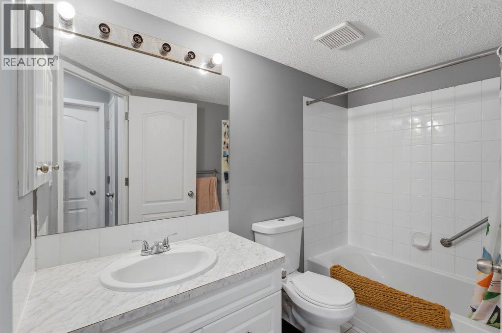 310, 20 Sierra Morena Mews SW, Calgary, Alberta  T3K 3K6 - Photo 19 - A2293099