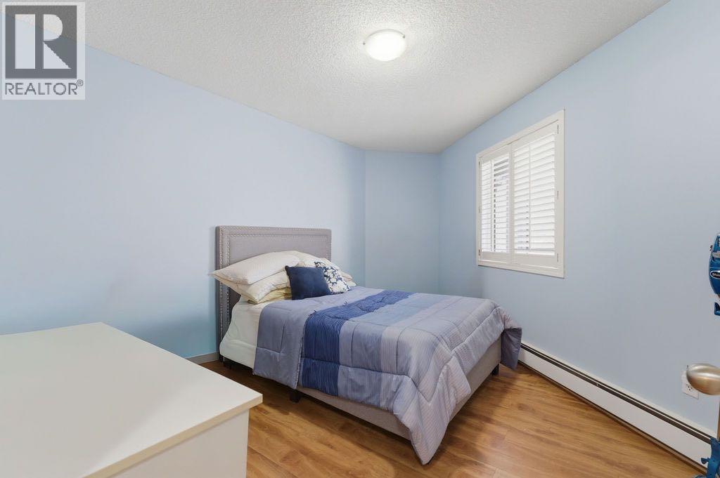 310, 20 Sierra Morena Mews SW, Calgary, Alberta  T3K 3K6 - Photo 18 - A2293099