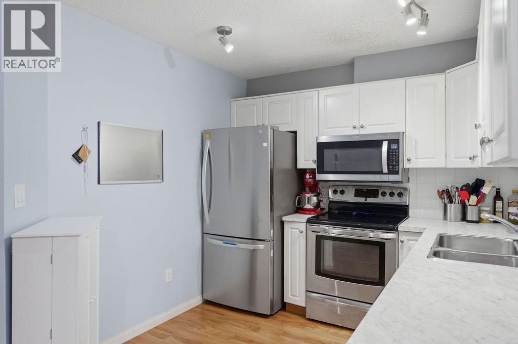 310, 20 Sierra Morena Mews SW, Calgary, Alberta  T3K 3K6 - Photo 7 - A2293099