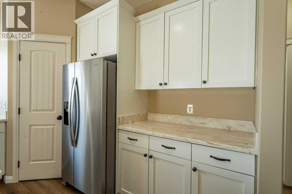 1008 Highland Green Drive Nw, High River, Alberta  T1V 1V8 - Photo 12 - A2285885