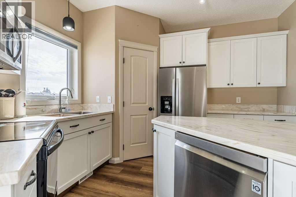 1008 Highland Green Drive Nw, High River, Alberta  T1V 1V8 - Photo 14 - A2285885