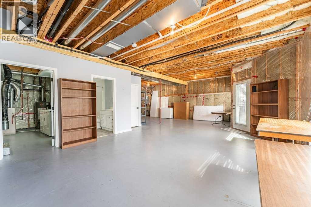 1008 Highland Green Drive Nw, High River, Alberta  T1V 1V8 - Photo 34 - A2285885