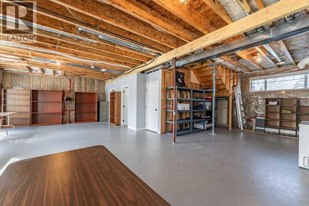 1008 Highland Green Drive Nw, High River, Alberta  T1V 1V8 - Photo 35 - A2285885