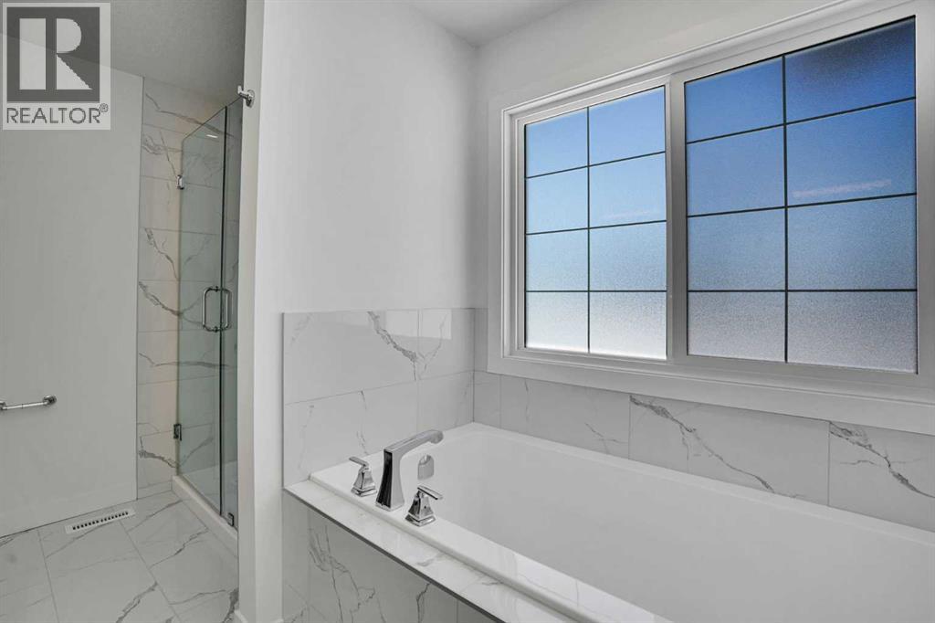 230 Kinniburgh Loop, Chestermere, Alberta  T1X 2S7 - Photo 47 - A2297172