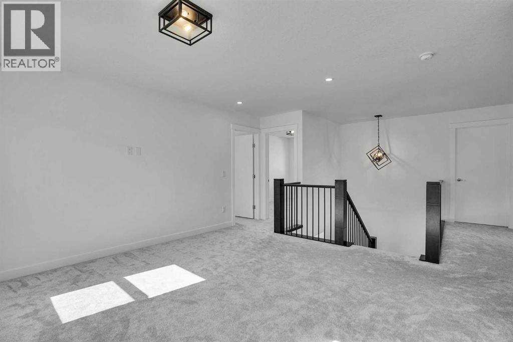 230 Kinniburgh Loop, Chestermere, Alberta  T1X 2S7 - Photo 34 - A2297172