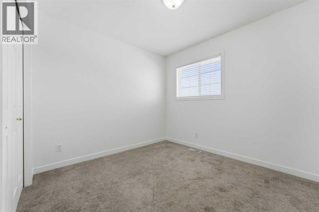 1, 12 Silver Creek Boulevard Nw, Airdrie, Alberta  T4B 2R2 - Photo 27 - A2298943