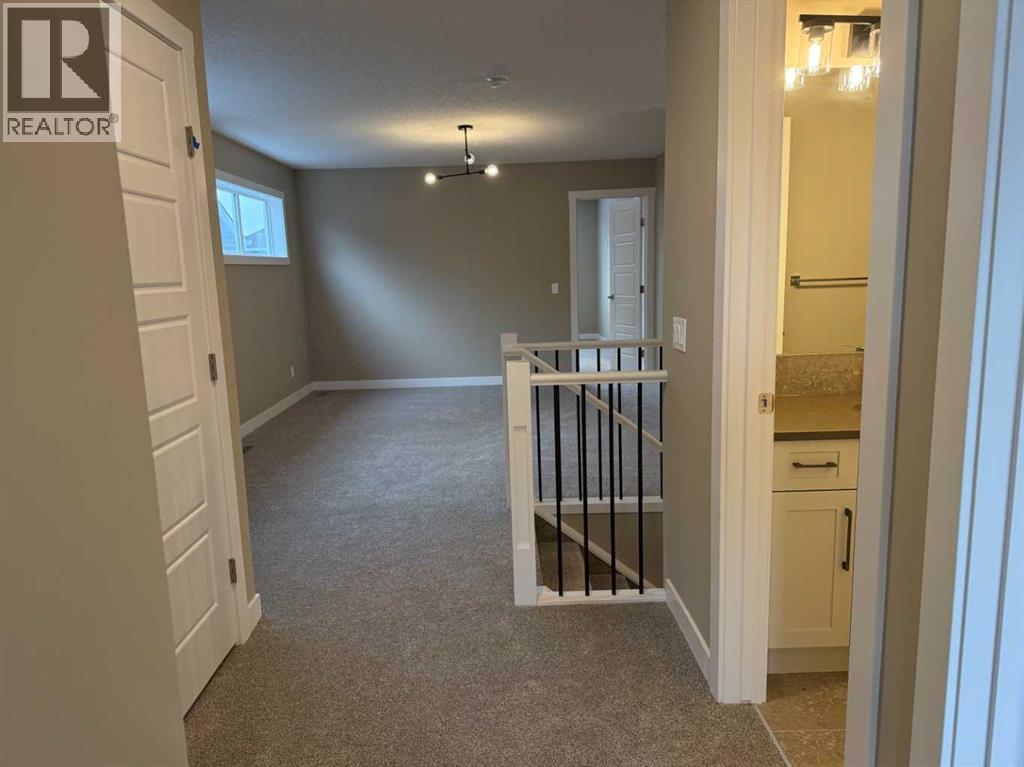 115 Sundown Crescent, Cochrane, Alberta  T4C 1Y3 - Photo 35 - A2297377