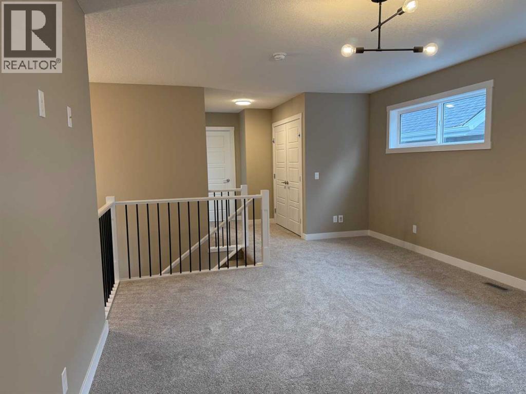 115 Sundown Crescent, Cochrane, Alberta  T4C 1Y3 - Photo 28 - A2297377