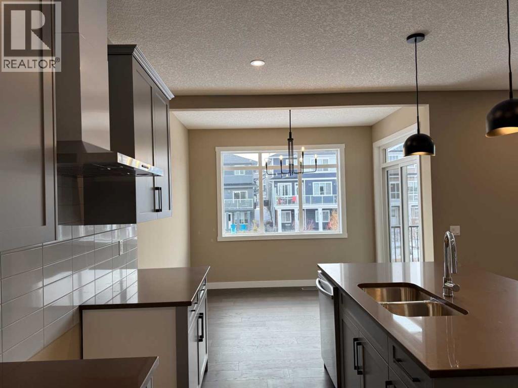 115 Sundown Crescent, Cochrane, Alberta  T4C 1Y3 - Photo 10 - A2297377