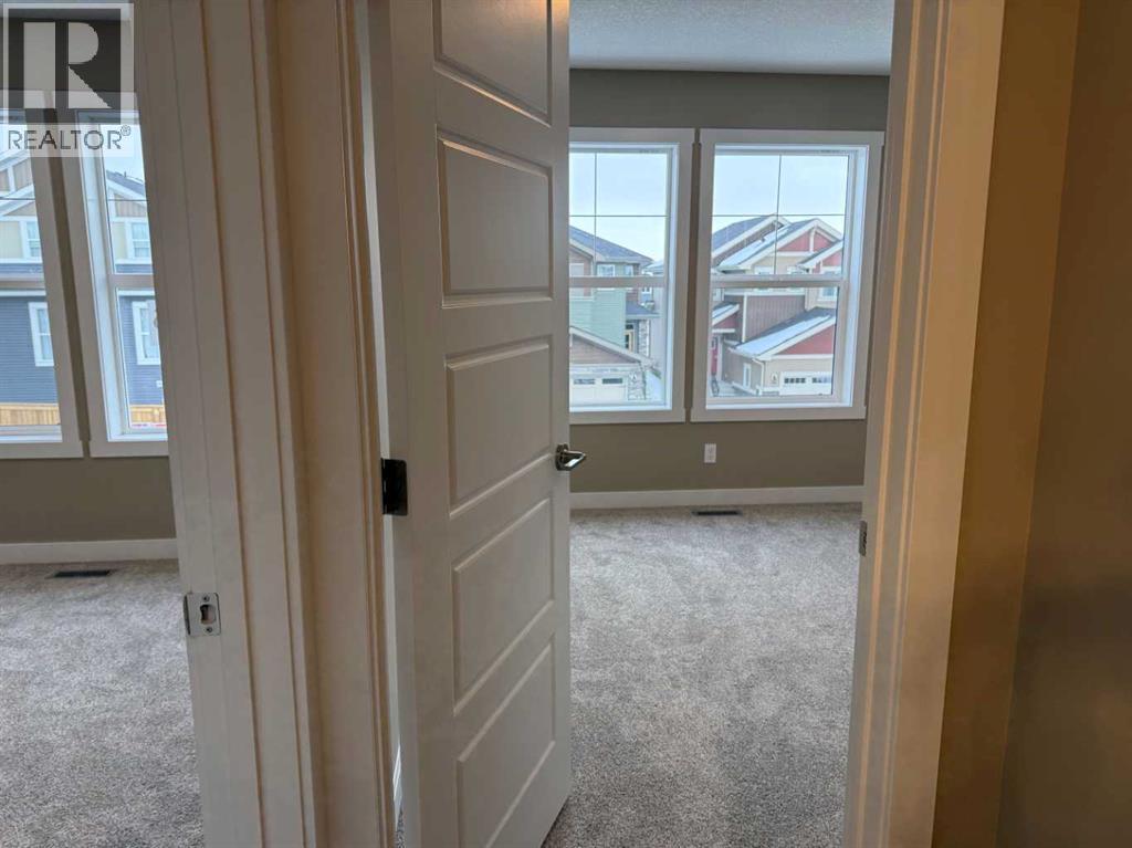 115 Sundown Crescent, Cochrane, Alberta  T4C 1Y3 - Photo 33 - A2297377