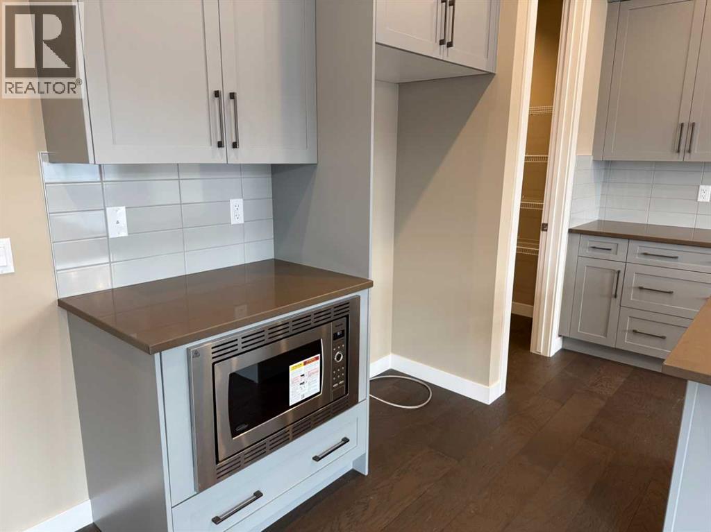 115 Sundown Crescent, Cochrane, Alberta  T4C 1Y3 - Photo 13 - A2297377