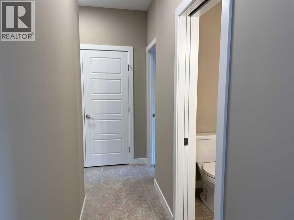 115 Sundown Crescent, Cochrane, Alberta  T4C 1Y3 - Photo 5 - A2297377