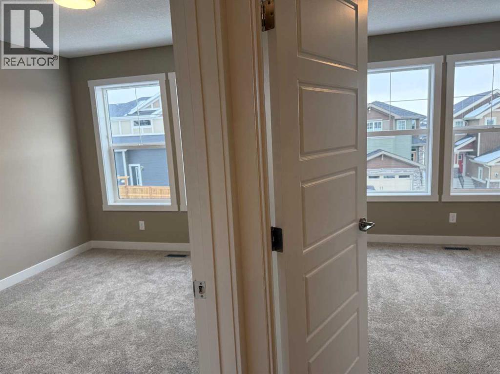 115 Sundown Crescent, Cochrane, Alberta  T4C 1Y3 - Photo 31 - A2297377