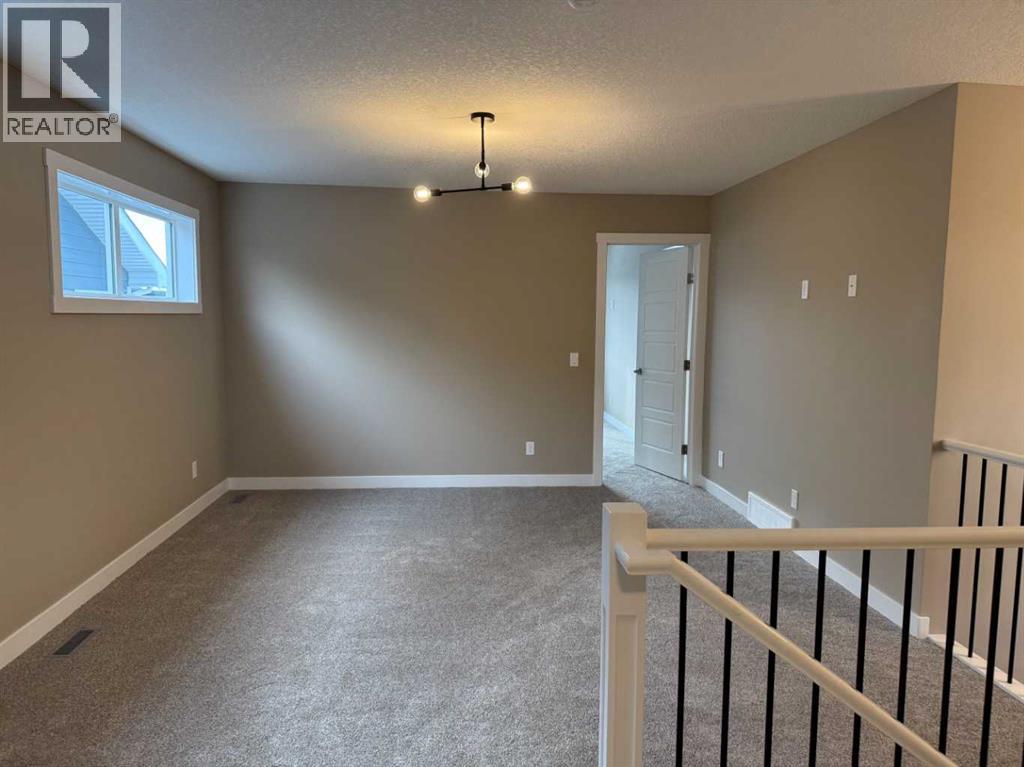 115 Sundown Crescent, Cochrane, Alberta  T4C 1Y3 - Photo 23 - A2297377