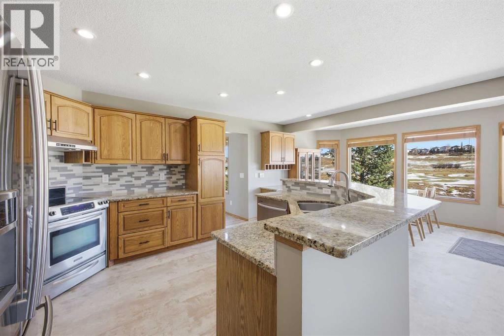 40 Country Hills Close NW, Calgary, Alberta  T3K 3Y9 - Photo 9 - A2292514