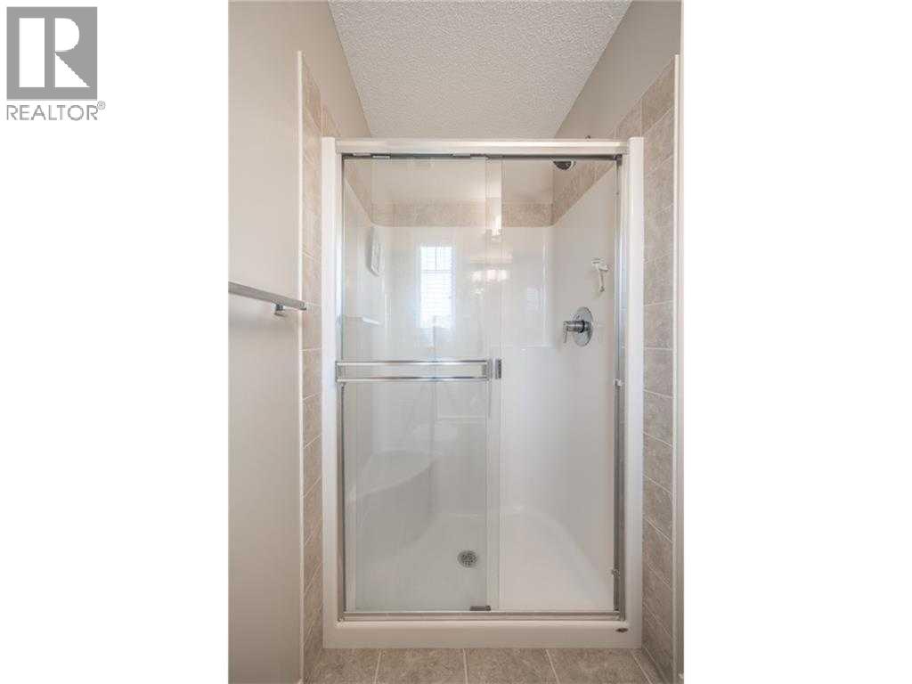 538 Panatella Walk NW, Calgary, Alberta  T3K 0Z4 - Photo 7 - A2299134