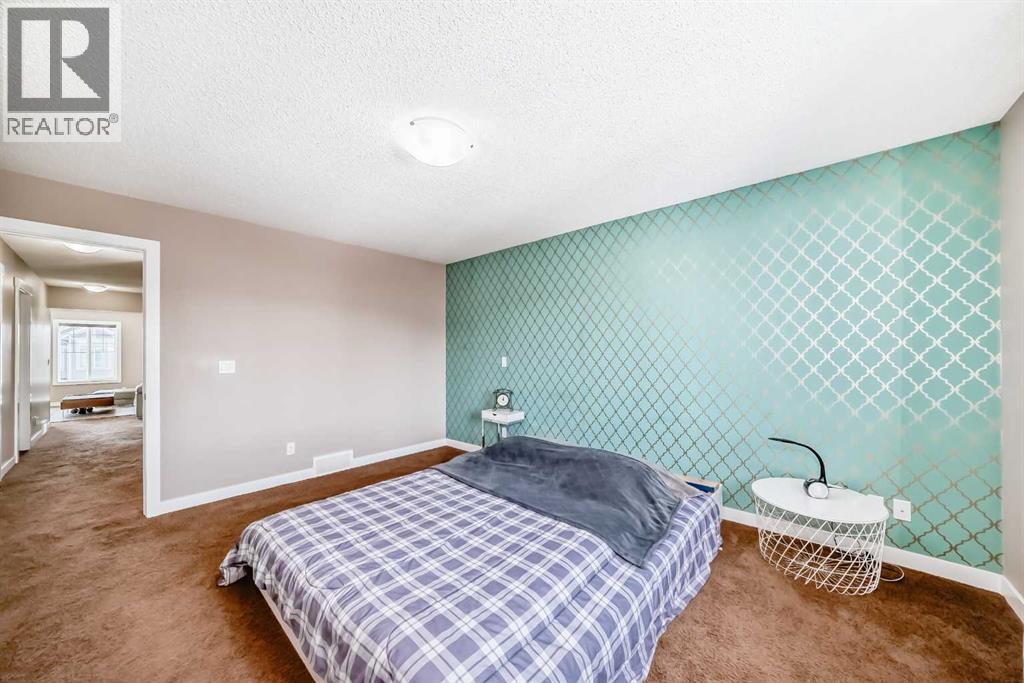 11 Cougar Ridge Place SW, Calgary, Alberta  T3H 0V3 - Photo 17 - A2288548