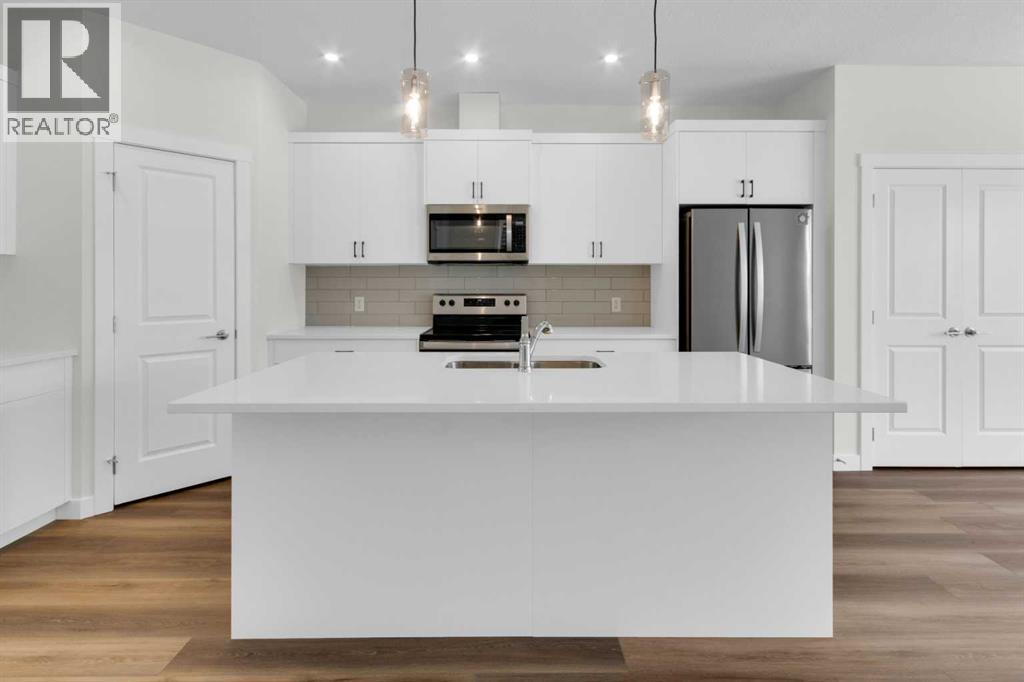 1139 Chinook Winds Circle SW, Airdrie, Alberta  T4B 5S7 - Photo 4 - A2292913