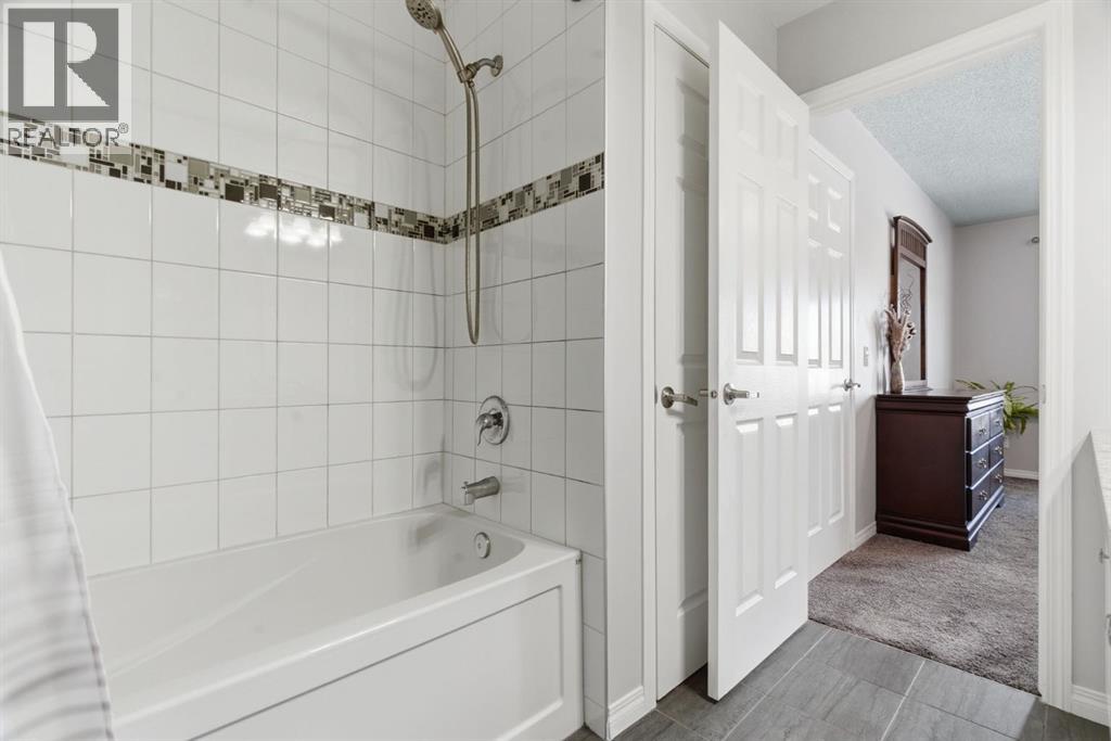 405 Windstone Grove SW, Airdrie, Alberta  T4B 2P9 - Photo 32 - A2292789