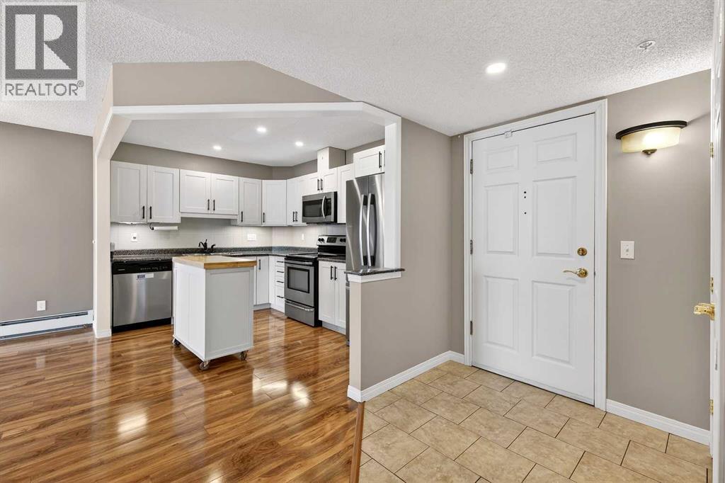 1311, 1311 Hawksbrow Point NW, Calgary, Alberta  T3G 4C9 - Photo 4 - A2297197