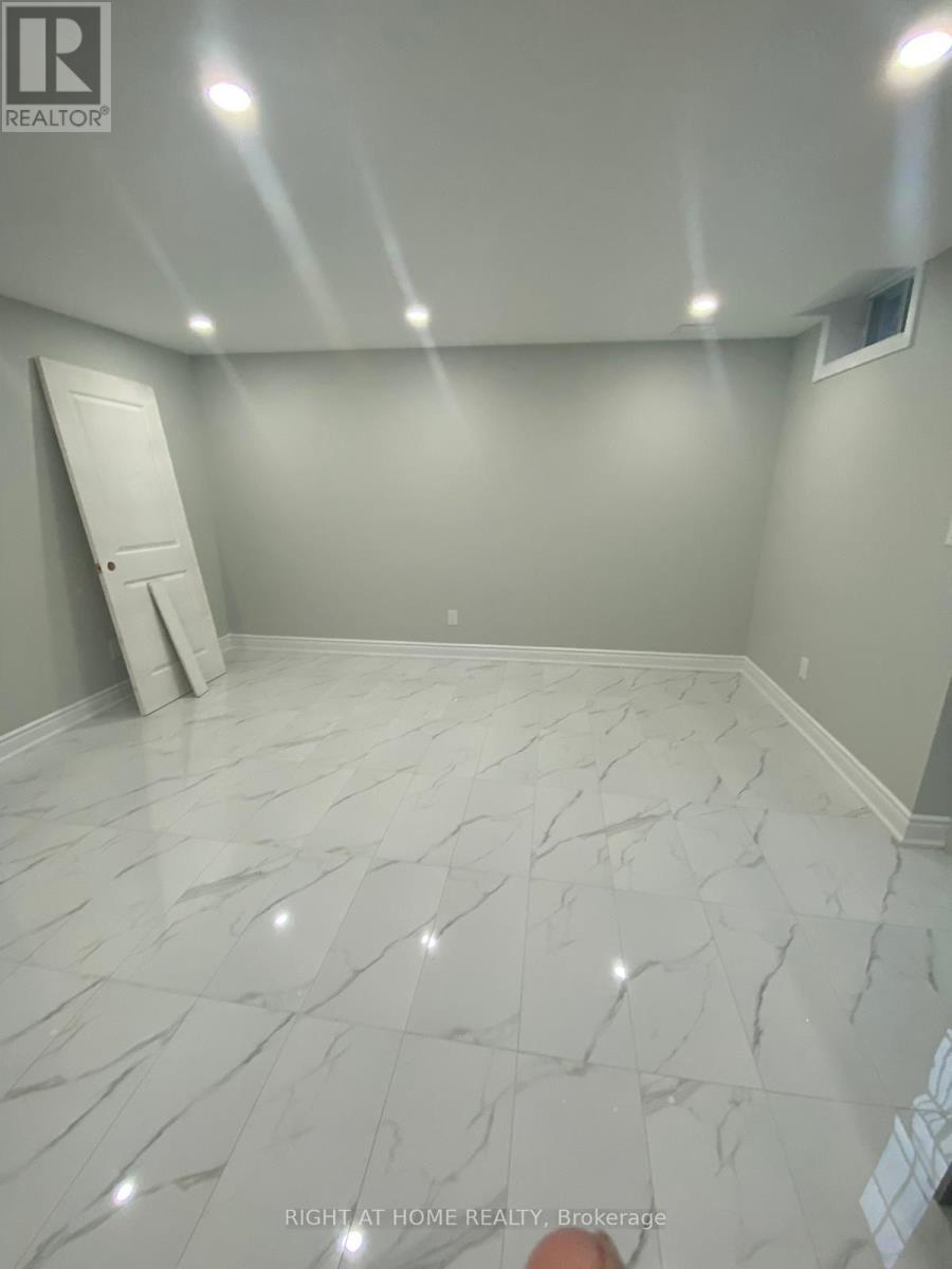 Basement - 409 Comiskey Crescent, Mississauga, Ontario  L5W 0C6 - Photo 8 - W12958390