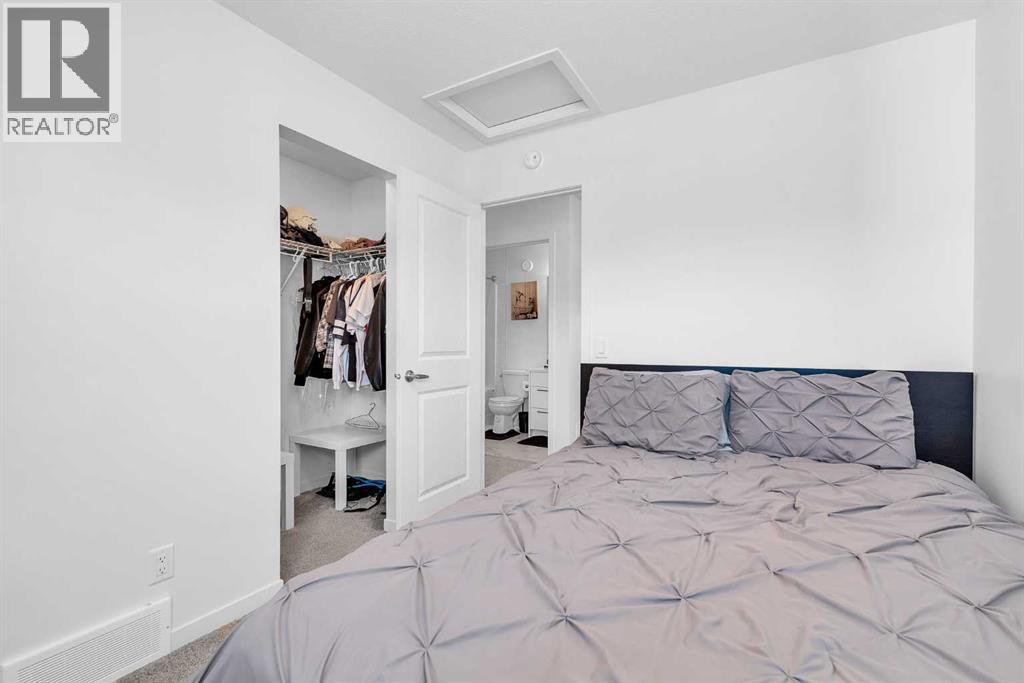 52 Edith Gate NW, Calgary, Alberta  T3A 1Z2 - Photo 29 - A2295677