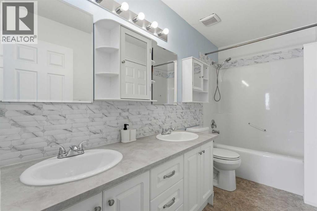 1, 12 Silver Creek Boulevard NW, Airdrie, Alberta  T4B 2R2 - Photo 22 - A2298943