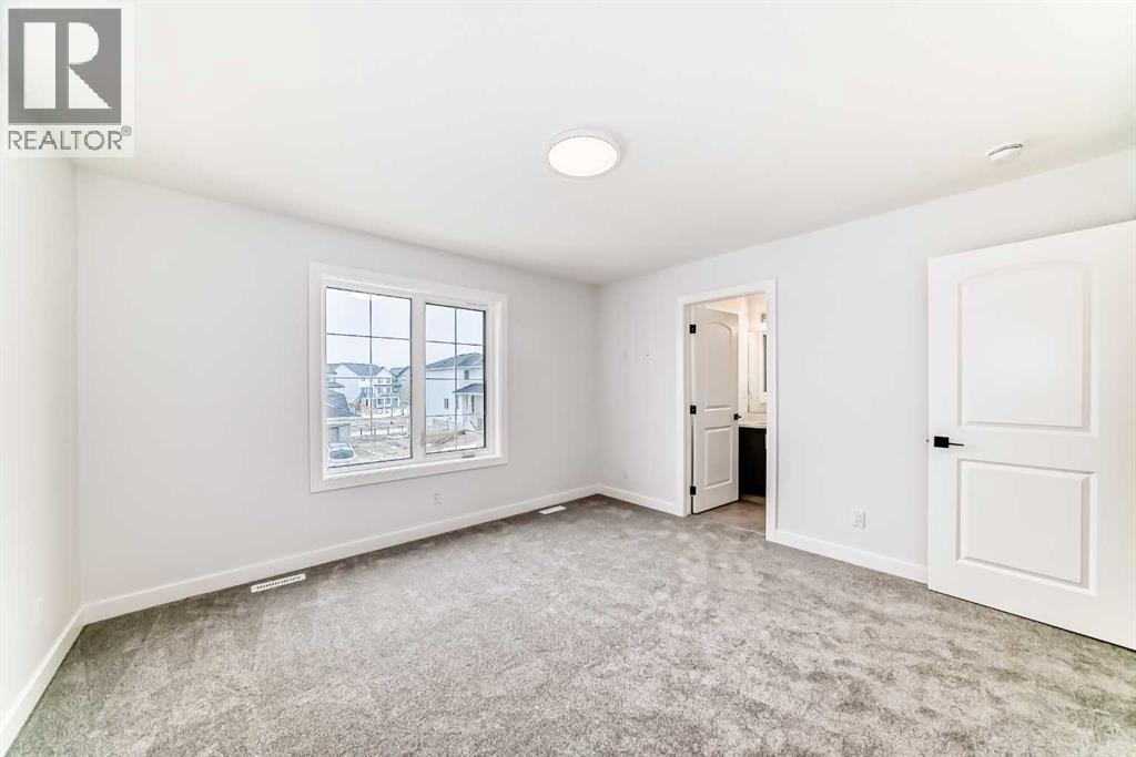 48 Monarch Bend, Rural Rocky View County, Alberta  T3Z 0K3 - Photo 19 - A2292429