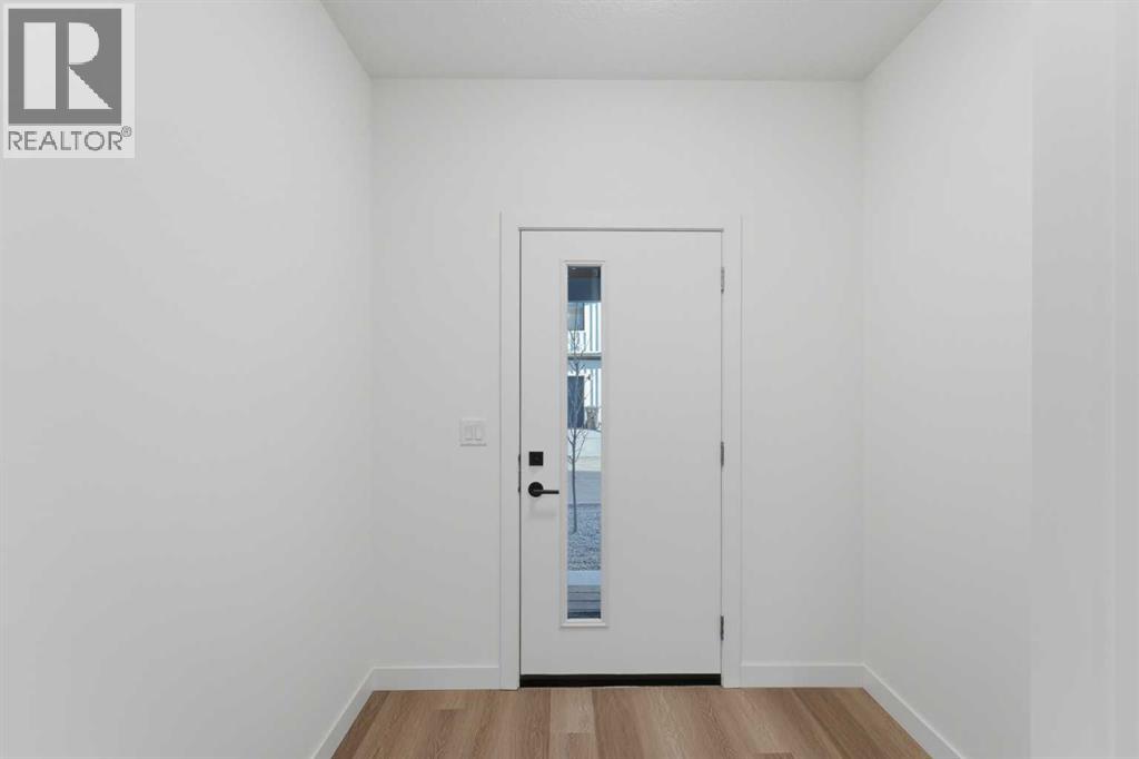 802, 201 Cooperswood Green Sw, Airdrie, Alberta  T3B 3Y6 - Photo 3 - A2283423