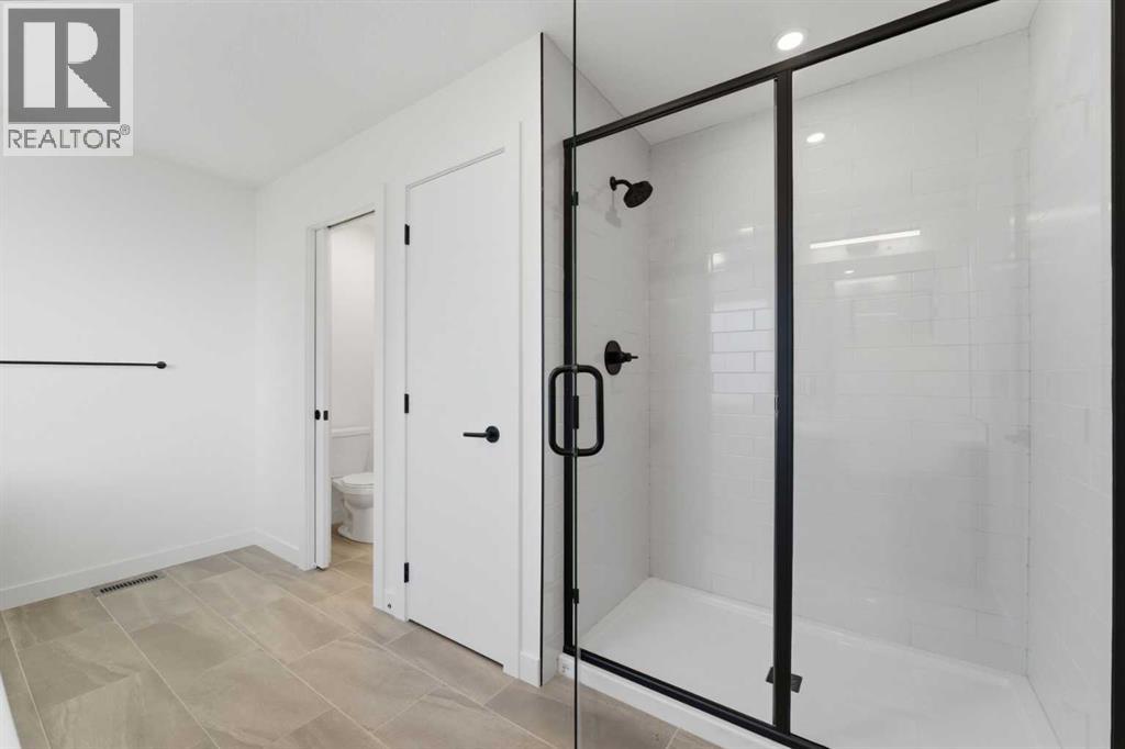 802, 201 Cooperswood Green Sw, Airdrie, Alberta  T3B 3Y6 - Photo 29 - A2283423