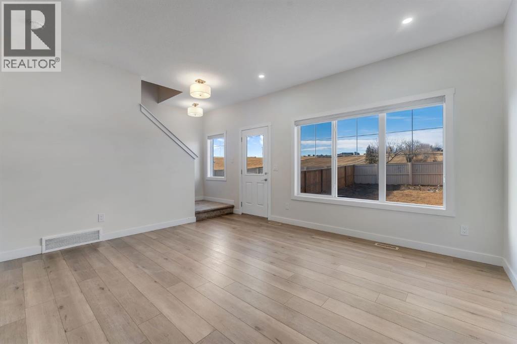 1489 Bayview Point Sw, Airdrie, Alberta  T4B 5K1 - Photo 16 - A2297844