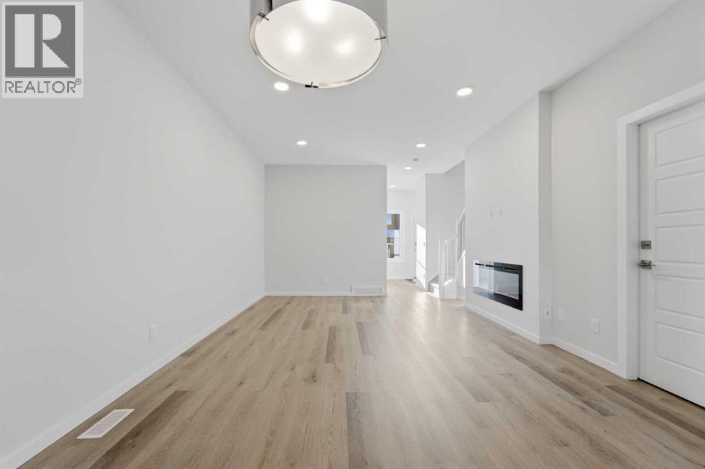 8 Heartwood Lane SE, Calgary, Alberta  T3S 0P9 - Photo 5 - A2291577