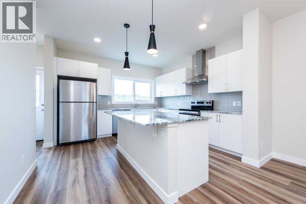 671 Wolf Willow Boulevard SE, Calgary, Alberta  T2X 5R2 - Photo 12 - A2299111