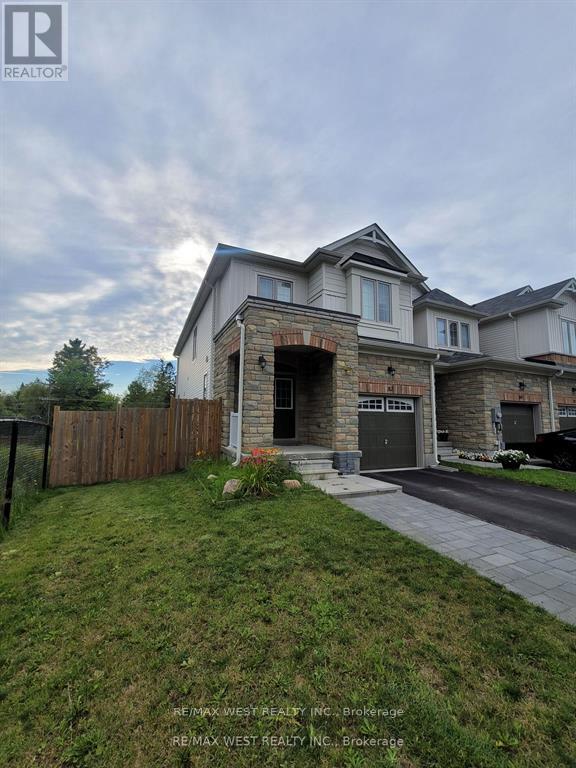 82 Greenwood Drive, Essa, Ontario  L0M 1B4 - Photo 2 - N12958746