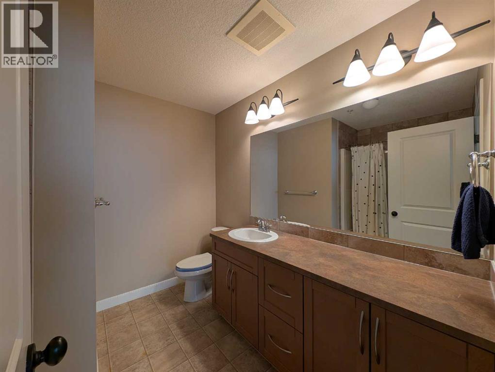 203, 35 Aspenmont Heights SW, Calgary, Alberta  T3H 0E5 - Photo 12 - A2291530