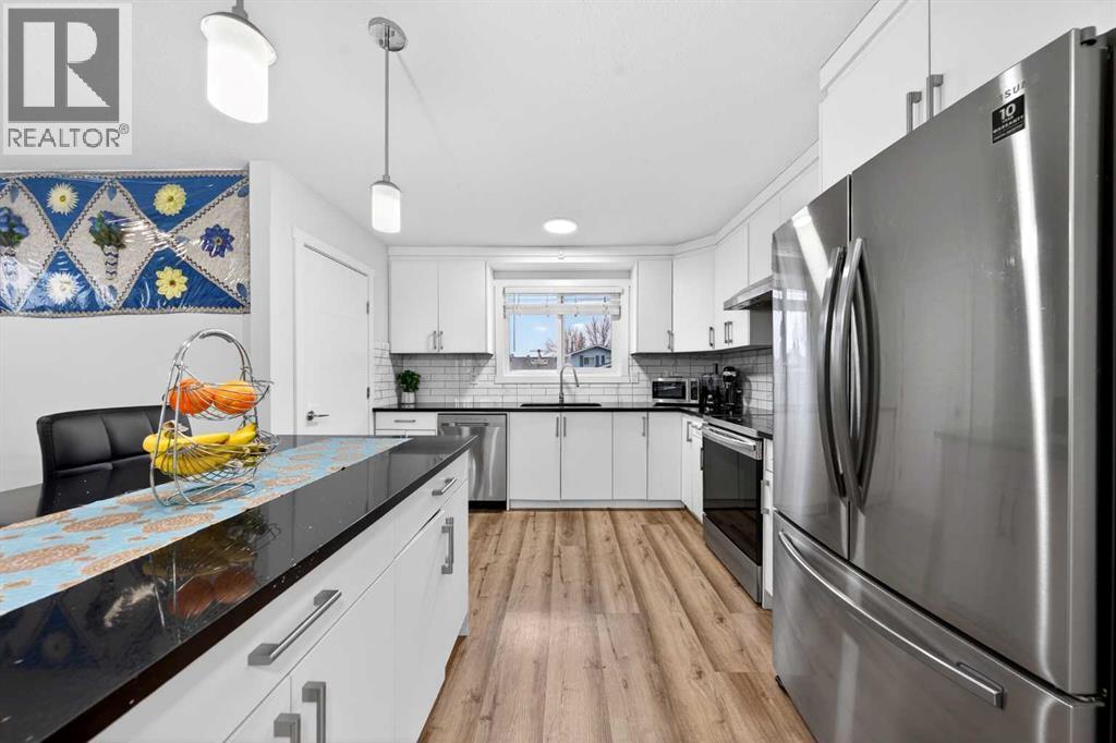 4915 Rundlehorn Drive Ne, Calgary, Alberta  T1Y 3A3 - Photo 7 - A2298513