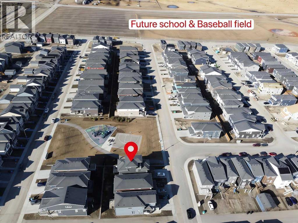 47 Amblefield Grove Nw, Calgary, Alberta T3P 2B7 - Photo 4 - A2295378