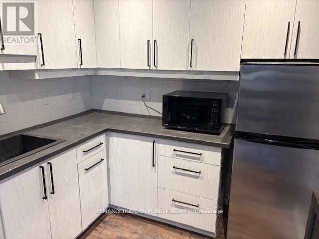 27 - 220 Industrial Parkway S, Aurora, Ontario  L4G 3V6 - Photo 5 - N12959338