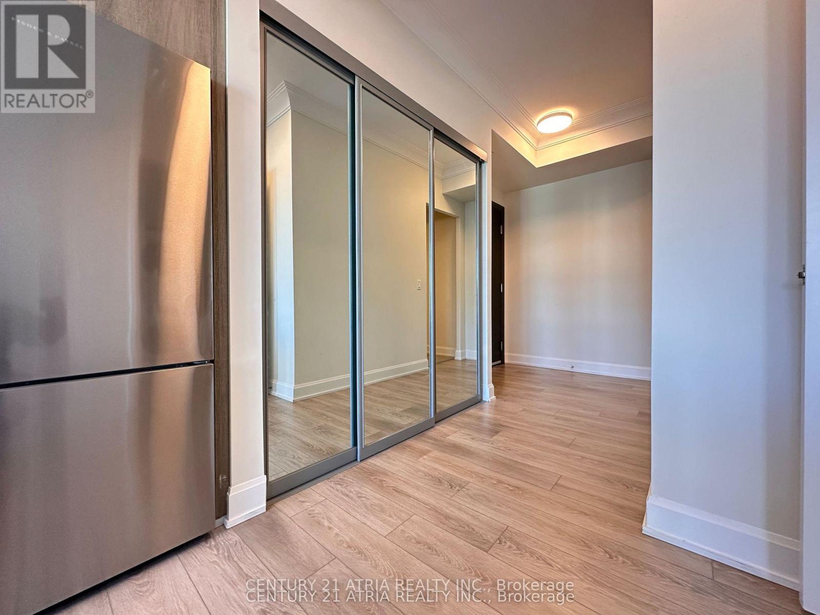 1008 - 18 Water Walk Drive, Markham, Ontario  L3R 6L5 - Photo 3 - N12959360