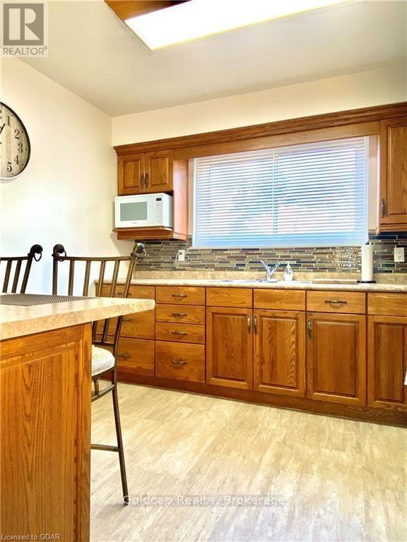 13 - 201 Silvercreek Parkway N, Guelph, Ontario  N1H 3T4 - Photo 5 - X12959562