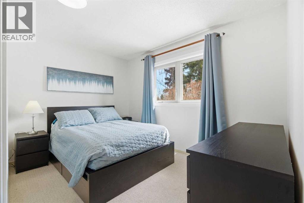 7 Woodmont Rise SW, Calgary, Alberta  T2W 4L4 - Photo 21 - A2298701