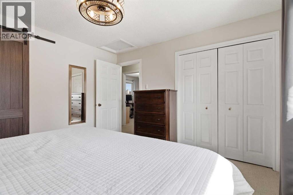 7 Woodmont Rise SW, Calgary, Alberta  T2W 4L4 - Photo 18 - A2298701