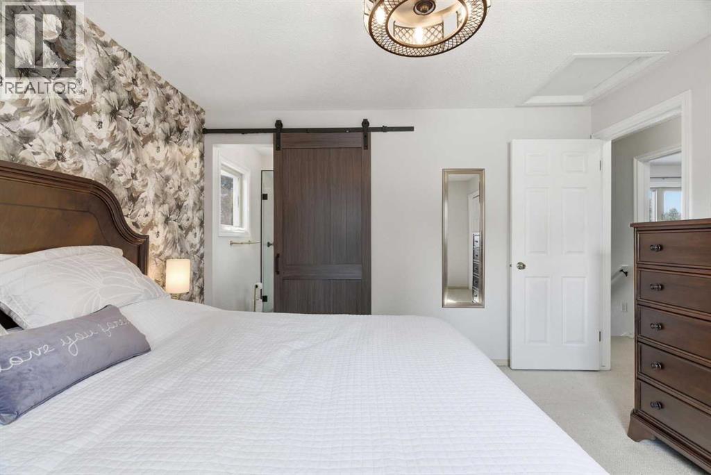 7 Woodmont Rise SW, Calgary, Alberta  T2W 4L4 - Photo 17 - A2298701