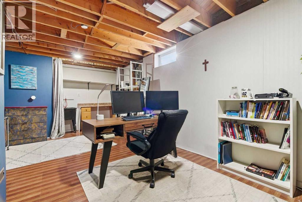 7 Woodmont Rise SW, Calgary, Alberta  T2W 4L4 - Photo 44 - A2298701