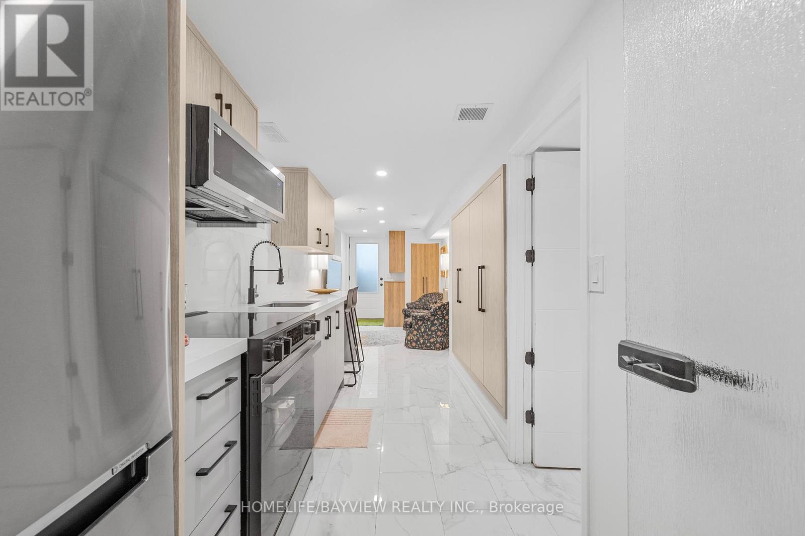 9 Kenworthy Avenue, Toronto, Ontario  M1L 3B1 - Photo 11 - E12959646